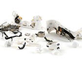 The AirPods Pro 3 (pictured here, torn apart) received a deafening 0 out of 10 in repairability from iFixit. (Image source: iFixit)