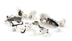 The AirPods Pro 3 (pictured here, torn apart) received a deafening 0 out of 10 in repairability from iFixit. (Image source: iFixit)