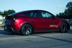 A Tesla Model Y robotaxi painted in Ultra Red. (Image source: @AdanGuajardo/X)