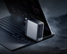 The 360W Cuktech laptop charger comes with a 5525 DC port. Pictured: a promo picture of the adapter with an laptop.