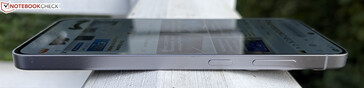Right: function button, volume rocker