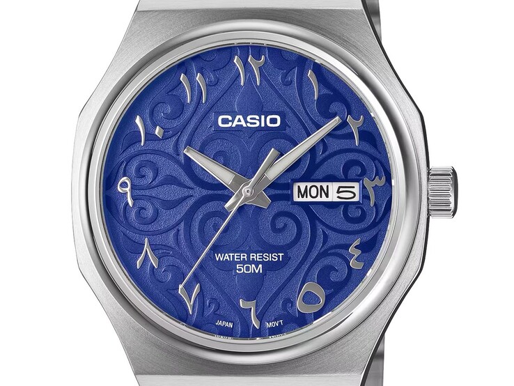 Close-up of the Casio MTP-E735AR-2A2V showing its vivid blue arabesque-patterned dial, applied Eastern Arabic numerals, faceted silver sword-style hands, and day-date display at 3 o’clock.