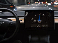 Tesla FSD in the driver's seat. (Image source: Tesla)