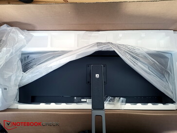 Install the stand with the monitor still in the packaging to help you lift the display out of the box.