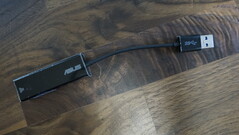 An Ethernet to USB 3.0 adapter is included.