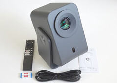 The TCL C1 is packaged with a quick start manual, an AC power cord, and a remote control with two batteries. (Image source: Notebookcheck)