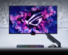 Asus ROG Switch PG27AQDM-R with a keyboard and mouse. (Image source: Asus)