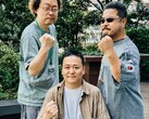 Former Tekken game development leaders Yonemori Ikeda and Harada raising their fists for a photo