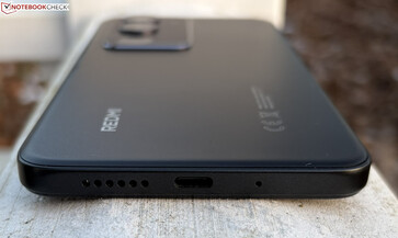 Bottom: speaker, USB-C port and microphone