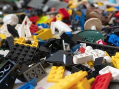 An image showing LEGO bricks scattered on the floor. (Image source: nikitozawr - Pixabay)