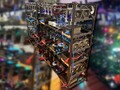 This large crypto mining rig includes two LHR RTX 3060 Ti boards along with both Nvidia and AMD cards. (Image source: Reddit u/miner69niner - edited)