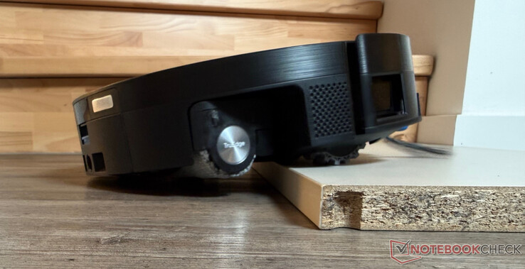 Ecovacs Deebot X11 OmniCyclone climbing a 2.4 cm high step