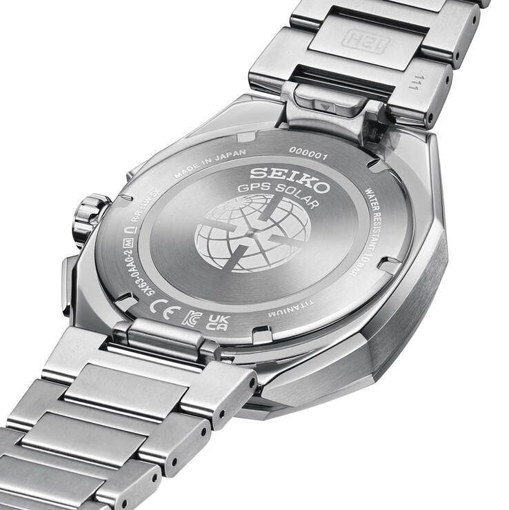 Rear view of the Seiko Astron GPS Solar watch showing the engraved case back, titanium bracelet, and clasp mechanism.