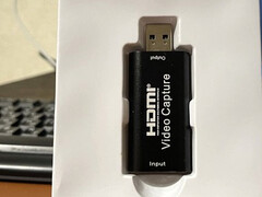 The adapter, about to be taken out of its inner white plastic packaging (Image source: ZachemKupil on MySKU, cropped, color-normalized)