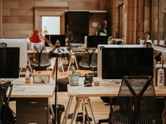 Workers report small boosts in speed and quality, with only about an hour saved per day. Comfortable work environment pictured. (Image source: Annie Spratt on Unsplash)