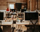 Workers report small boosts in speed and quality, with only about an hour saved per day. Comfortable work environment pictured. (Image source: Annie Spratt on Unsplash)