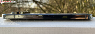 Left: power button with sonic fingerprint sensor, volume rocker