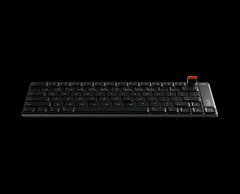 The keyboard is CNC-machined from a single block of aluminum and includes a detachable magnetic rotary dial for volume and media control.