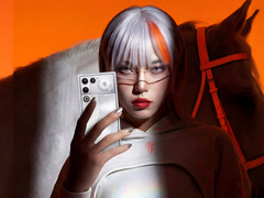 The 11 Air is set to launch on January 20, 2026. Pictured: a woman holding an Aurora Silver color model. (Image source: RedMagic)