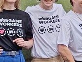 Fired Rockstar employees showcasing T-shirts to support legal battle.