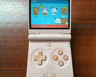 The Miyoo Mini Flip appears to have a smaller d-pad than the regular Miyoo Flip but the same-sized ABXY buttons. (Image source: GameboyJuntaro - edited)