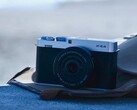 Fujifilm X E5 compact APS C camera on a bag on the beach