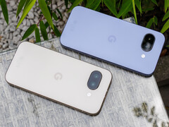 Google Pixel 9a smartphones in Porcelain and Iris colorways shown from the rear, highlighting the minimalist design and dual-camera module.
