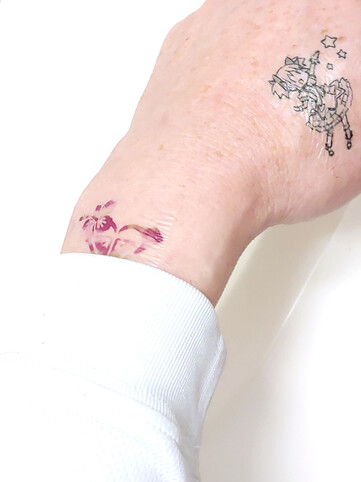 Tattoos before a shower.