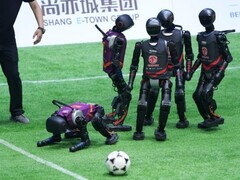 The first autonomous soccer tournament between humanoid robots marks a milestone in the advancement of AI-powered real-time interaction in robotics. (Image source: ecns)