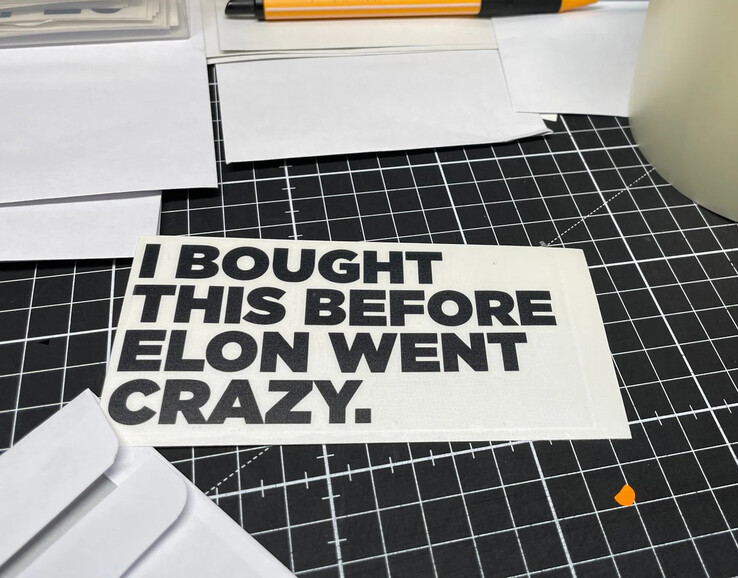 Entrepreneur Patrik Schneider produces stickers for Tesla drivers