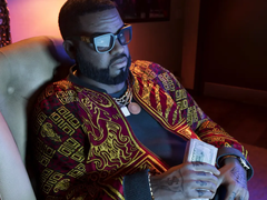 Grand Theft Auto VI's character Boobie Ike holding a wad of cash