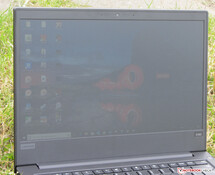 The ThinkPad outdoors (under a cloudy sky).