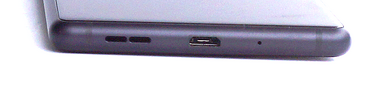 Lower edge: Speaker, USB port, microphone