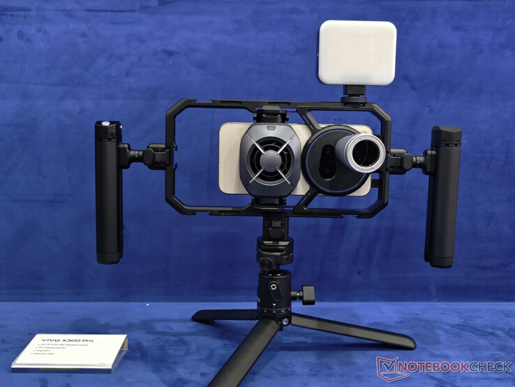 The Vivo X300 Pro inside the X300 Ultra's camera cage.