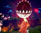 Palworld screenshot showing characters fighting a floating eyeball with sharp teeth