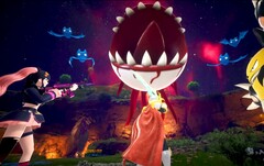 Palworld screenshot showing characters fighting a floating eyeball with sharp teeth