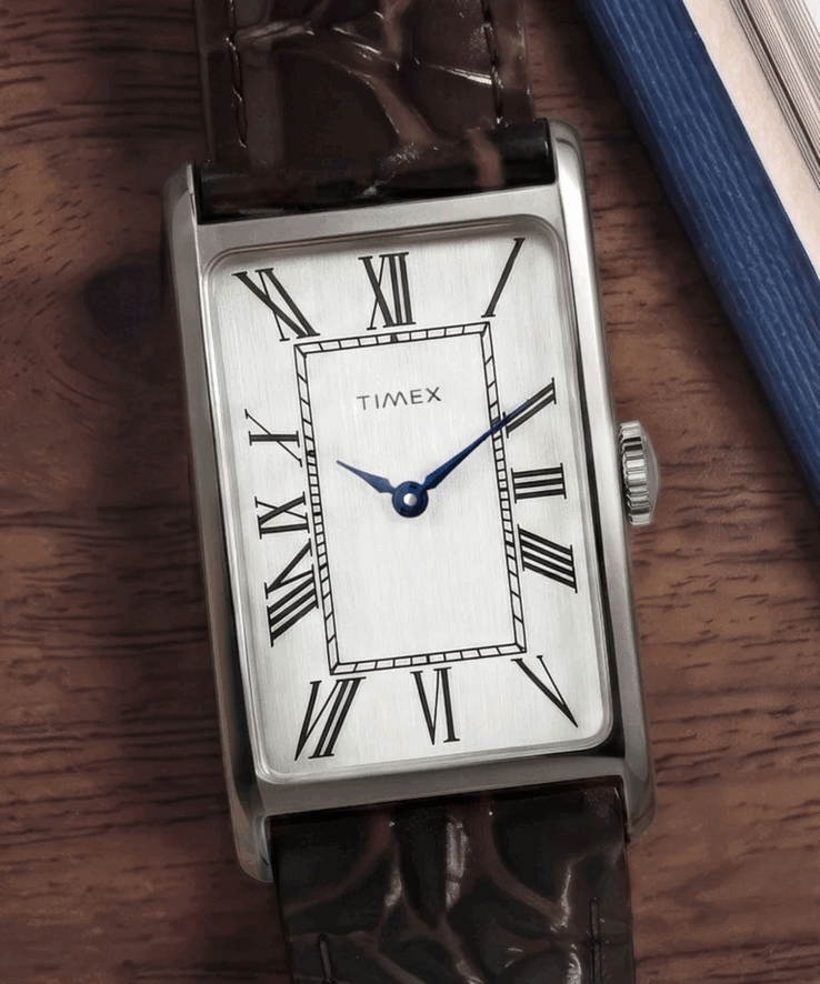 The case is polished stainless steel at 21mm wide, 36mm lug-to-lug, and 8.5mm thick, running on a standard quartz movement.