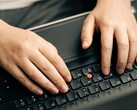 Hands typing on a laptop keyboard, symbolic image for Anthropic Claude Haiku 5.5