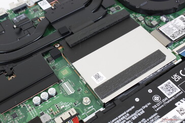 The two SODIMM slots are protected by an aluminum shield