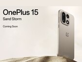 OnePlus 15 Sand Storm edition smartphone with triple camera setup showcased against a desert sand background. (Image source: OnePlus)