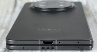 Bottom case side (microphone, USB port, speaker, microphone, SIM slot)