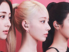 The Sony WF-1000XM5 earbuds, promoted here by Le Sserafim in smoky pink, are on sale at the lowest price ever on Amazon. (Image source: Sony via Amazon)