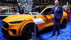 President Biden in Detroit next to a Mustang Mach-E (image: Reuters)