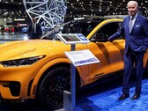 President Biden in Detroit next to a Mustang Mach-E (image: Reuters)