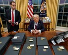 President Donald Trump, signing executive orders. (Image source: The White House)