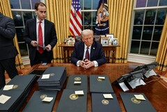 President Donald Trump, signing executive orders. (Image source: The White House)