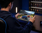 The new 11-inch gaming tablet has a starting retail price of around $456. Pictured: a promo picture showing the Y900 11 running a game.