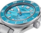 Close-up of the Seiko Prospex 1965 Heritage Diver showing its blue dial, date display, luminous hands and markers, and stainless steel case.