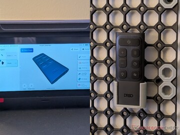 Scanned short remote and 3D printed holder.