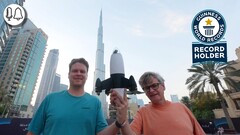 The engineers with their drone in hand (Mike Bell via YouTube)